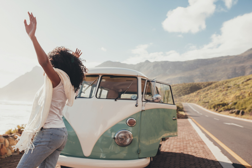 Woman Having Fun on Road Trip